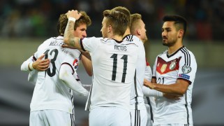 LEIPZIG, GERMANY - OCTOBER 11: Thomas Mueller of Germany (13) celebrates with team mates as he scores their first goal from the penalty spot during the UEFA EURO 2016 Group D qualifying match between Germany and Georgia at Stadium Leipzig on October 11, 2015 in Leipzig, Germany. (Photo by Matthias Hangst/Bongarts/Getty Images)