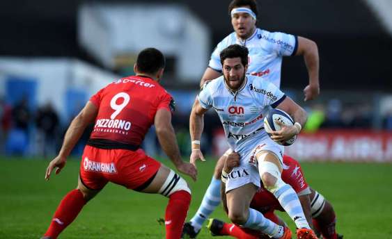 RC Toulon's French scrumhalf Jonathan Pelissie (L) vies with Racing Metro 92 French scrumhalf Maxime Machenaud during the European Rugby Champions Cup match between Racing Metro 92 and Toulon at Yves du Manoir stadium in Colombes on April 10, 2016. AFP PHOTO / FRANCK FIFEFRANCK FIFE/AFP/Getty Images